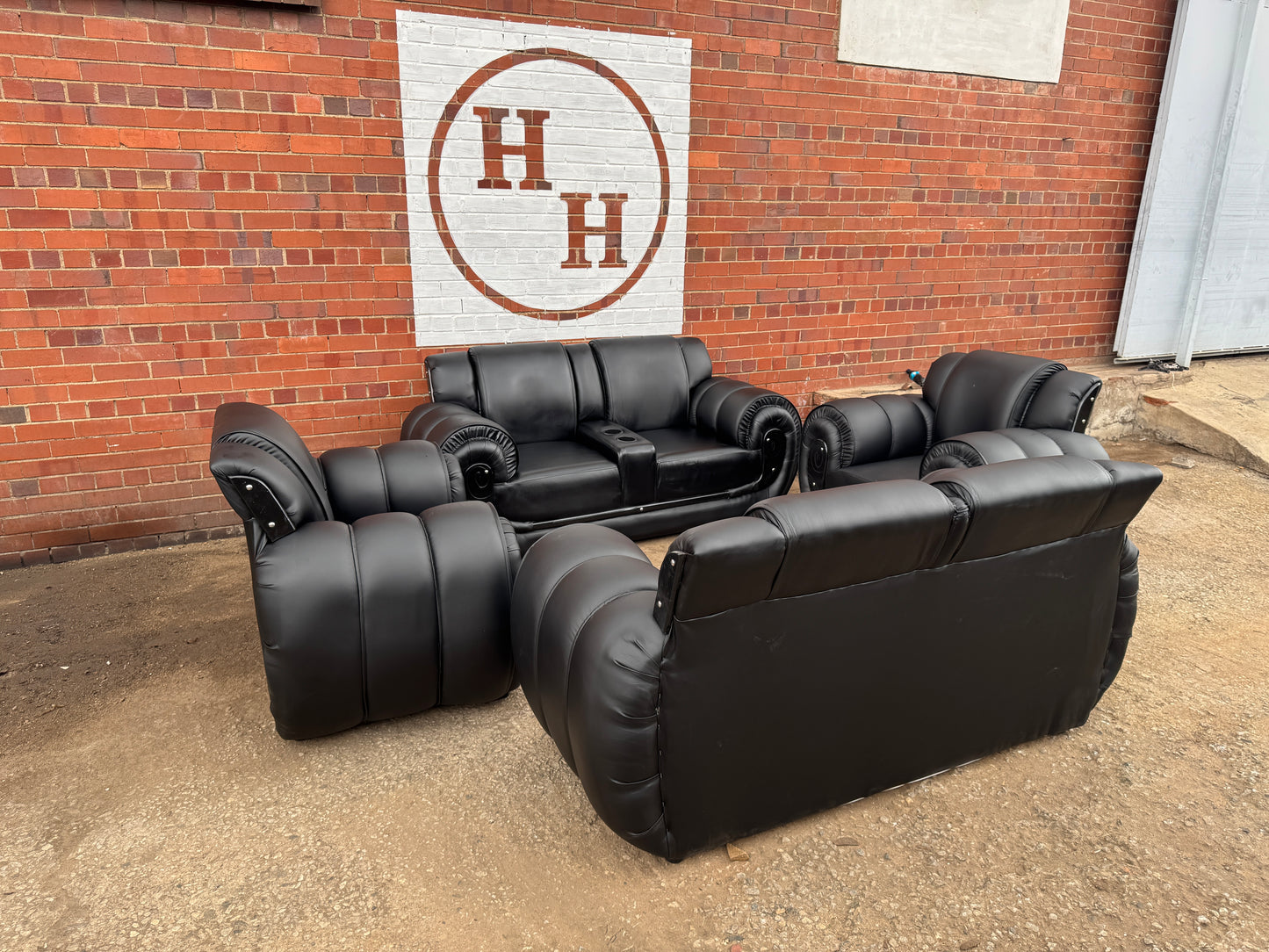 BLACK LEATHERRATE ELEPHANT  SOFA WITH CUP HOLDER